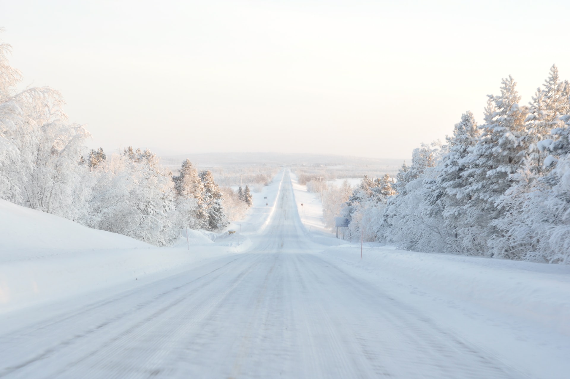 Picture of a snowy downhill road