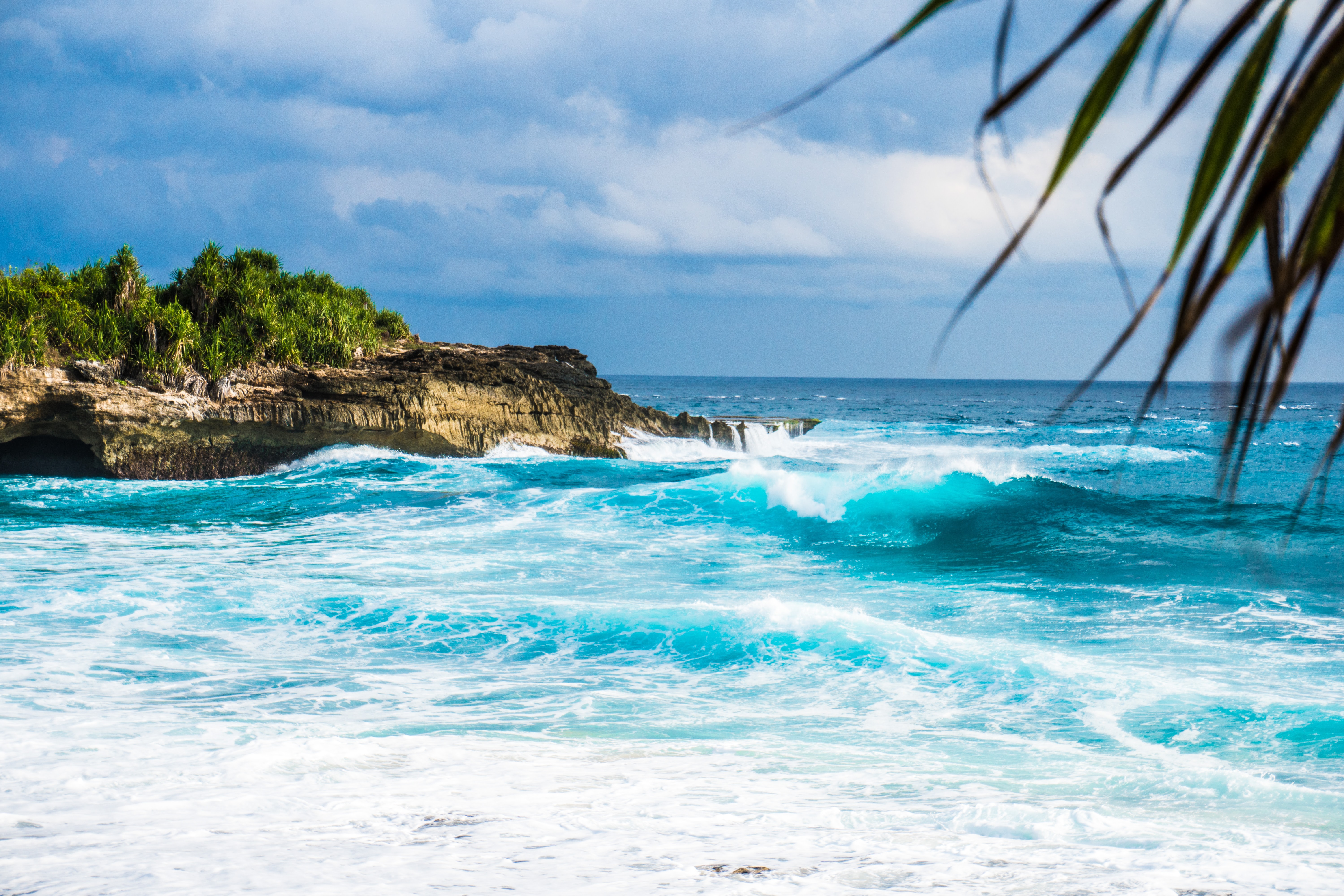 A stunning shade f blue sea and waves